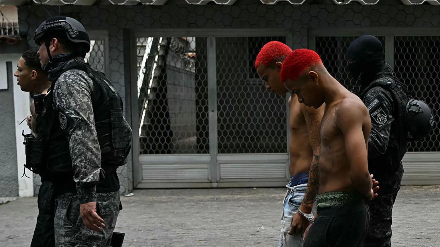 Brazil’s deadliest police raid questioned as targets evade capture