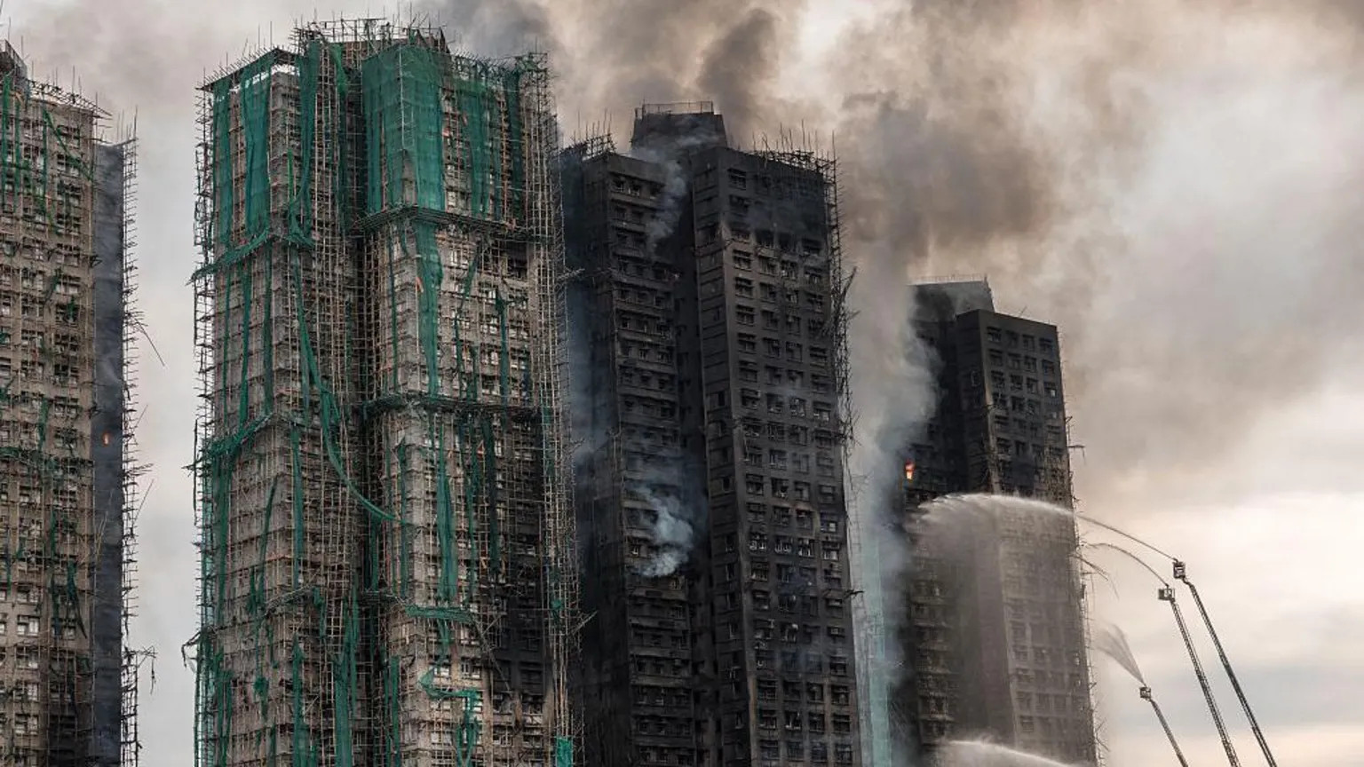 Hong Kong housing fire kills 128 as safety failures spark outrage