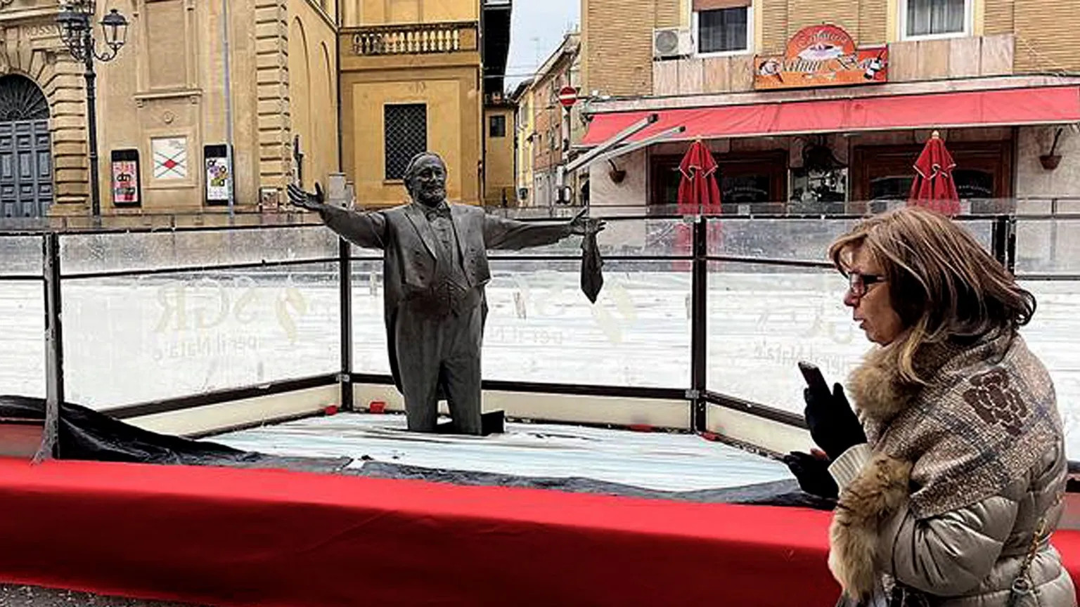 Italian mayor apologizes after Pavarotti statue encased in ice rink