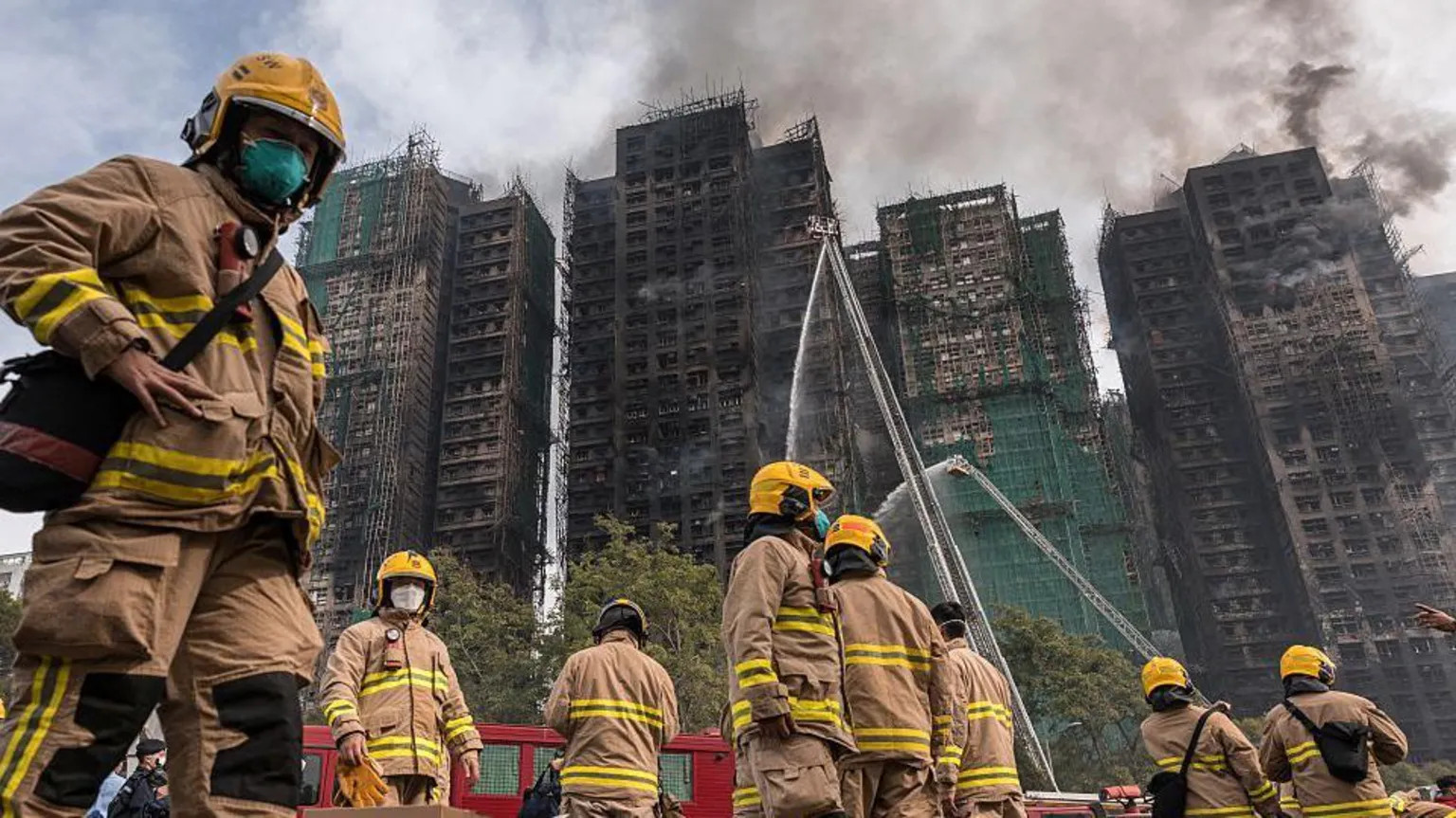 Hong Kong orders independent probe into deadly housing fire as arrests rise