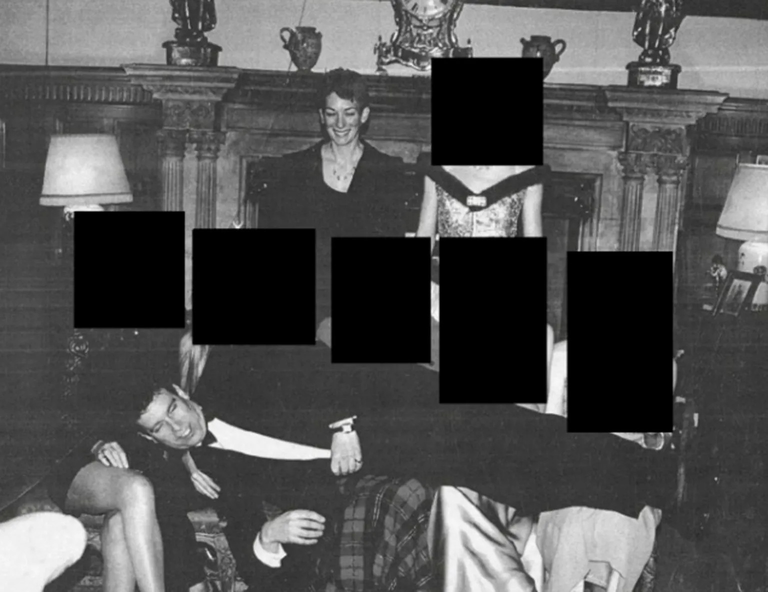 Newly released Epstein files include photo of Andrew Mountbatten-Windsor with Maxwell