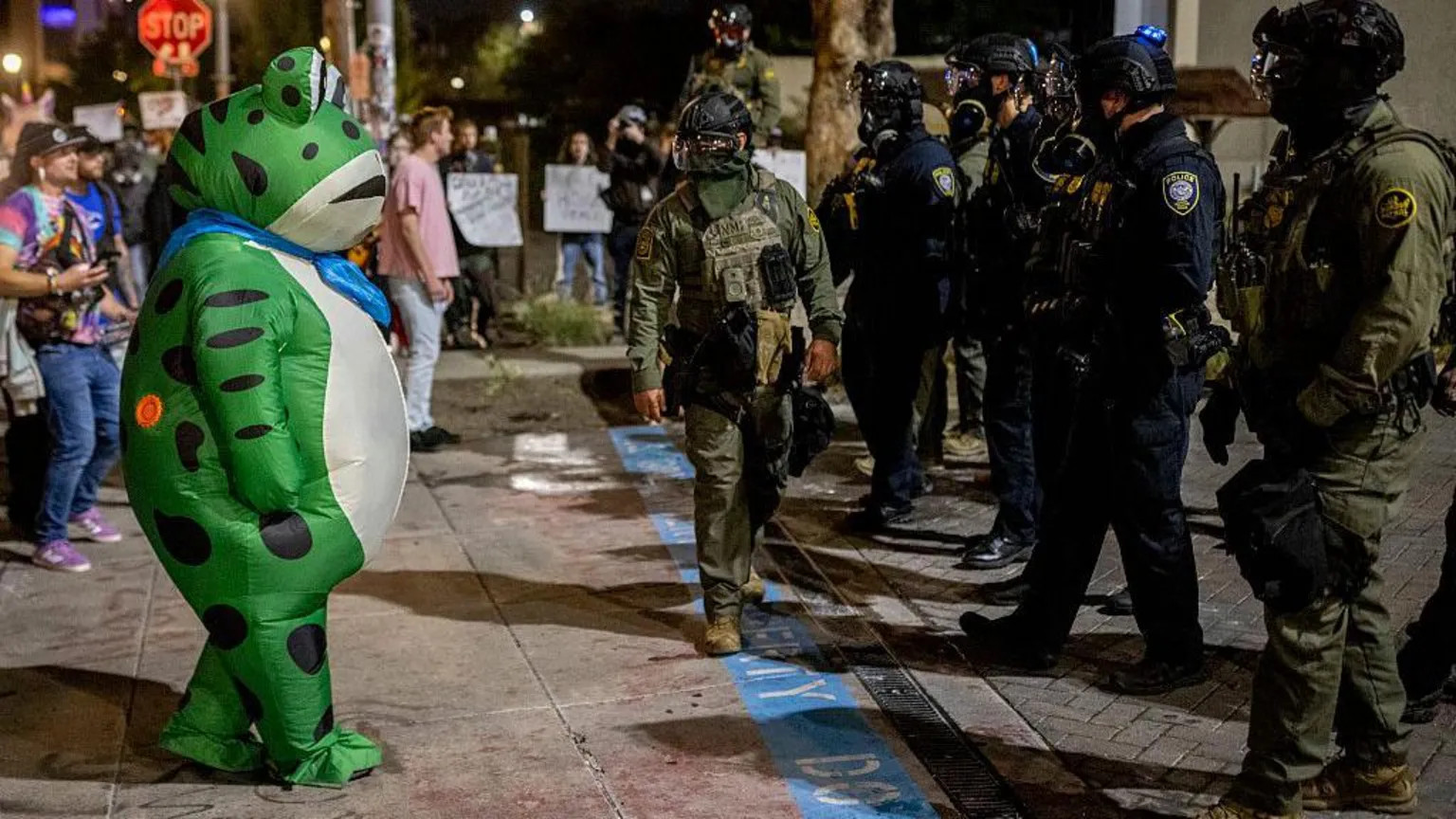 Protesters adopt inflatable frogs as symbols of resistance against Trump