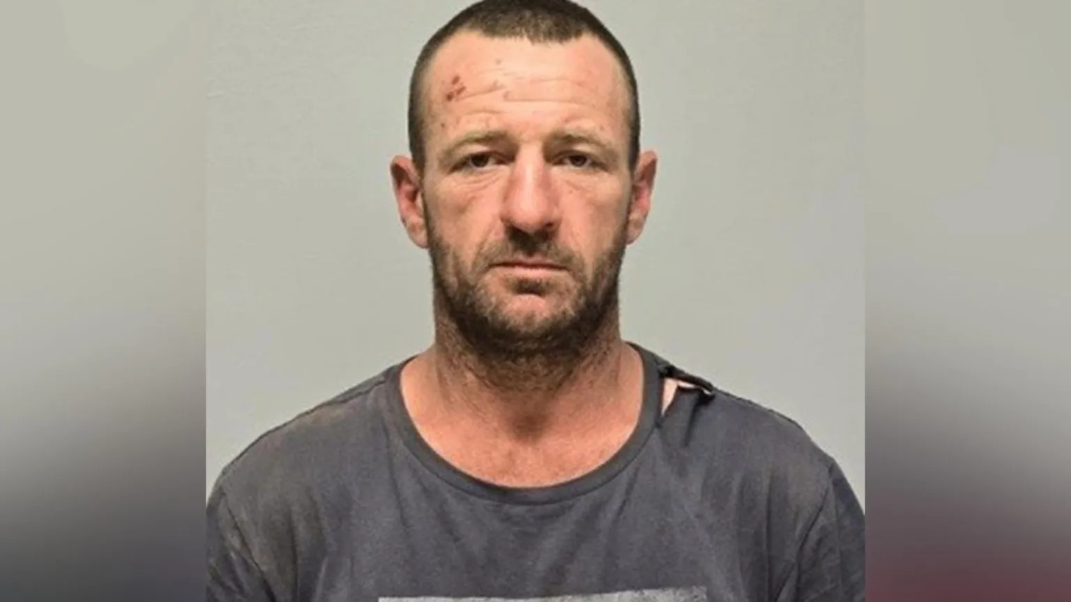 Fugitive on bail for domestic violence linked to triple shooting in rural Australia