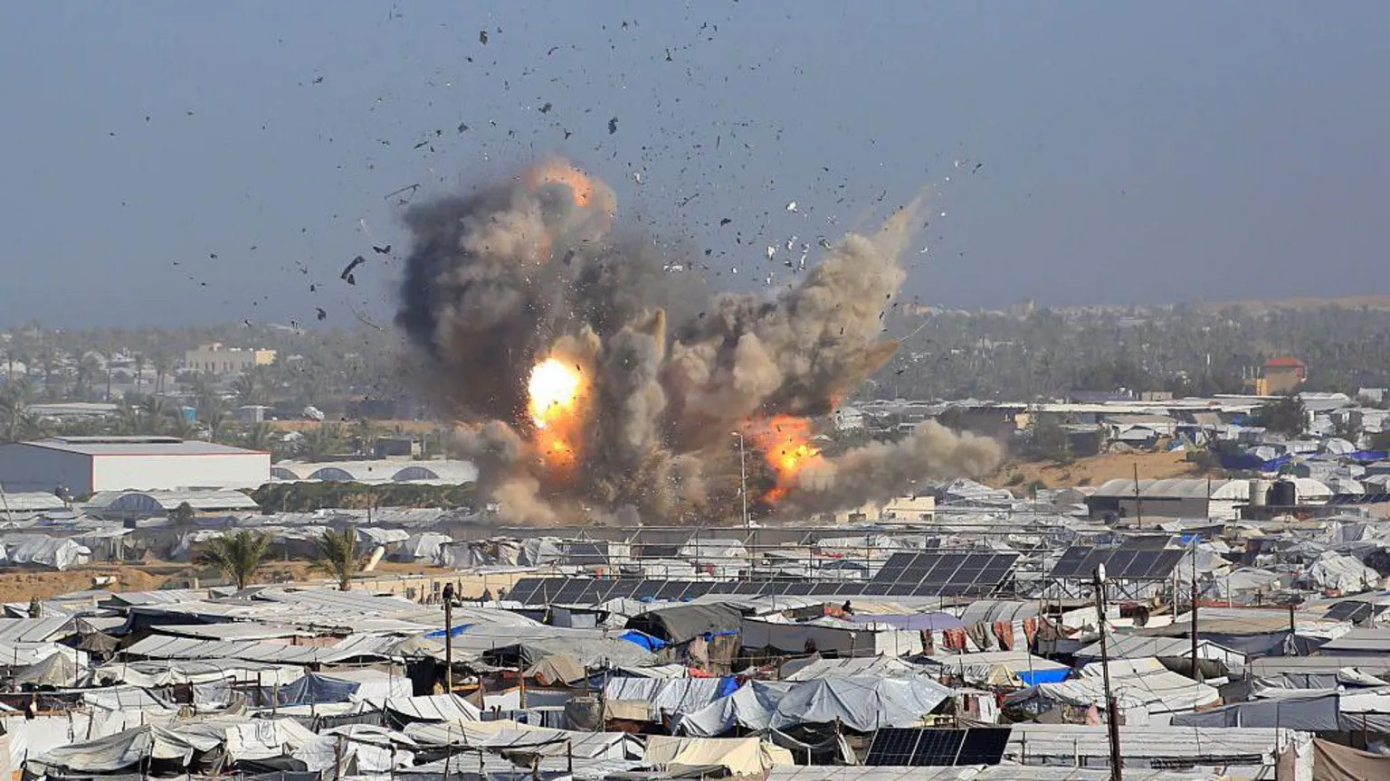 Israeli air strikes kill 32 in Gaza as truce violations escalate