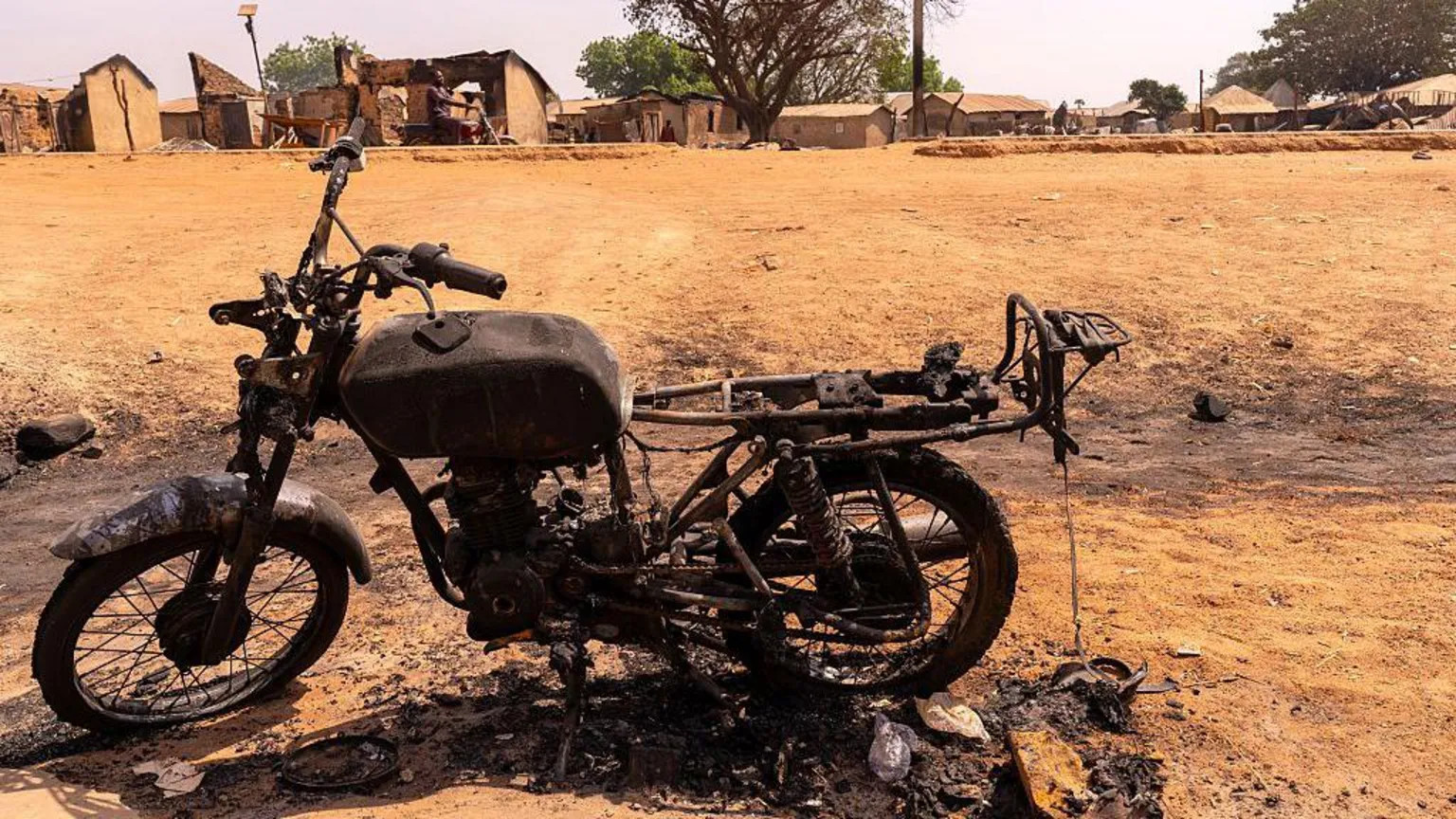 Motorcycle gunmen kill at least 46 in Nigeria village raids