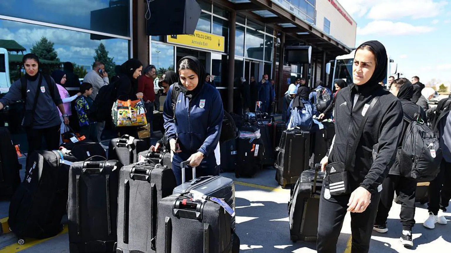 Iran women's football players return after abandoning asylum bids