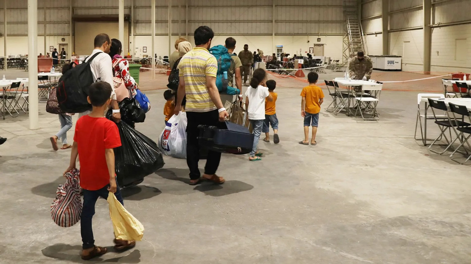 Afghan evacuees stranded in Qatar as US resettlement route shuts down