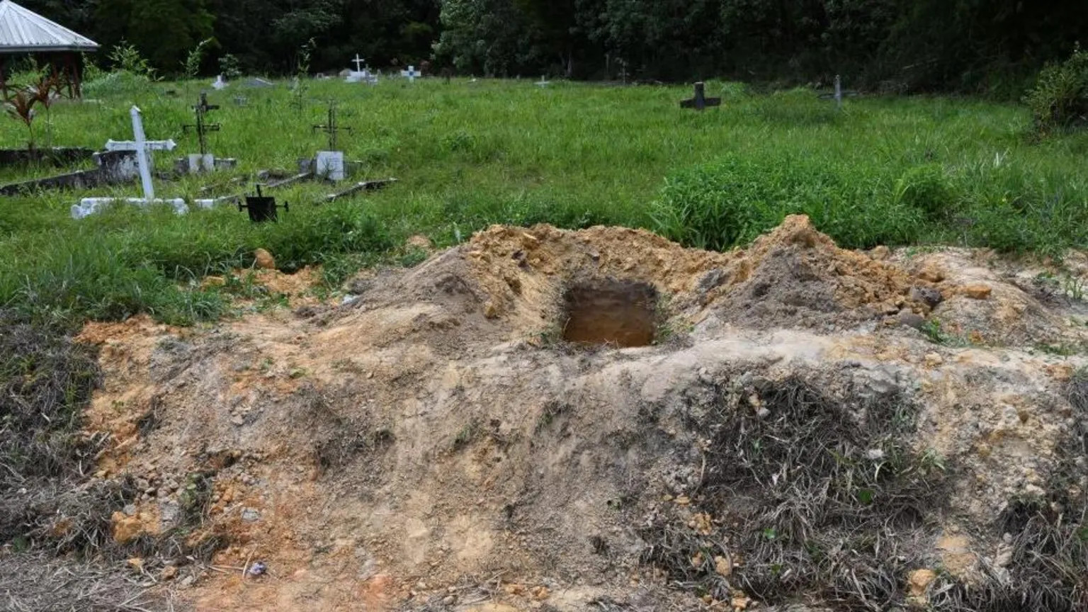 Police find remains of 50 infants and six adults in Trinidad and Tobago graveyard