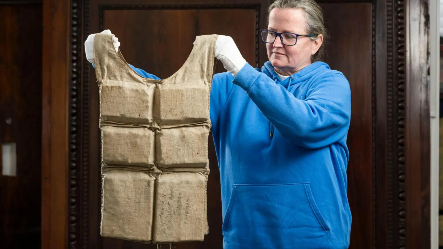 Titanic survivor's life jacket fetches £670,000 at UK auction