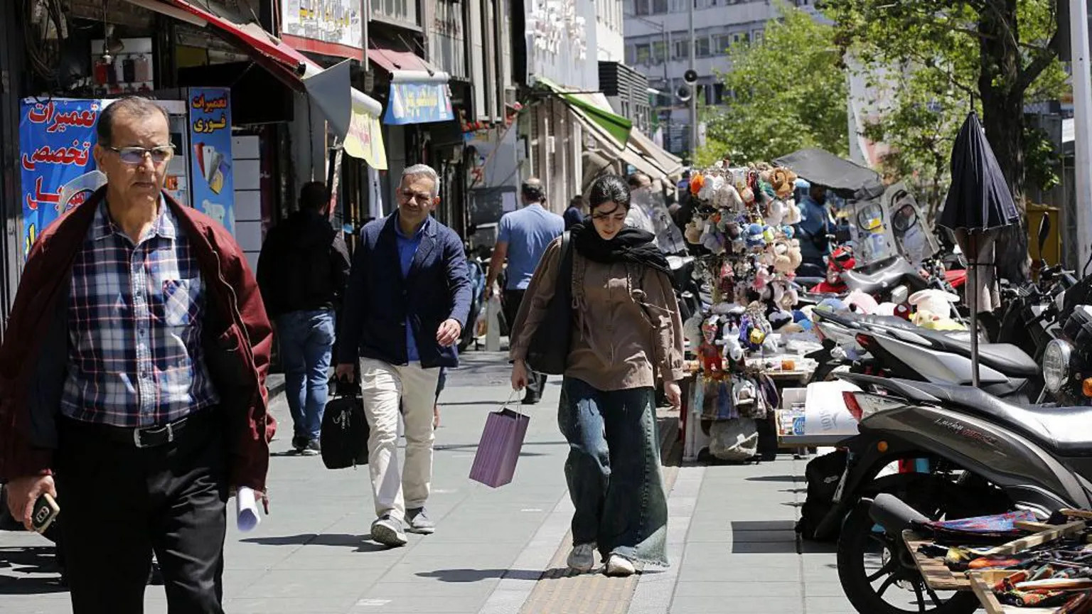 Tehran residents navigate daily life amid economic strain and political uncertainty