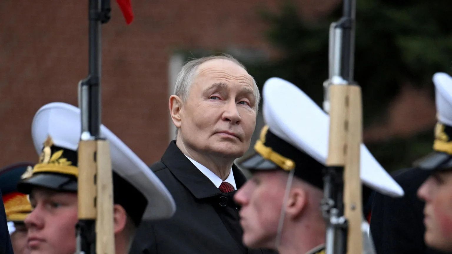 Putin defends Ukraine war in Victory Day speech as Russia scales back parade