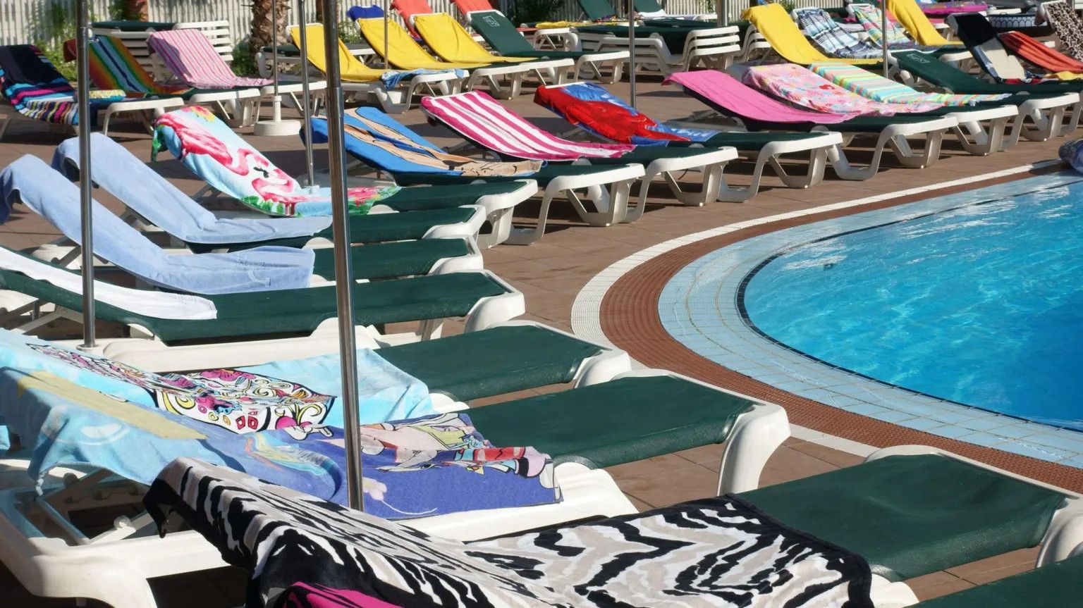 Holidaymakers win legal battle over sun lounger towel reservations