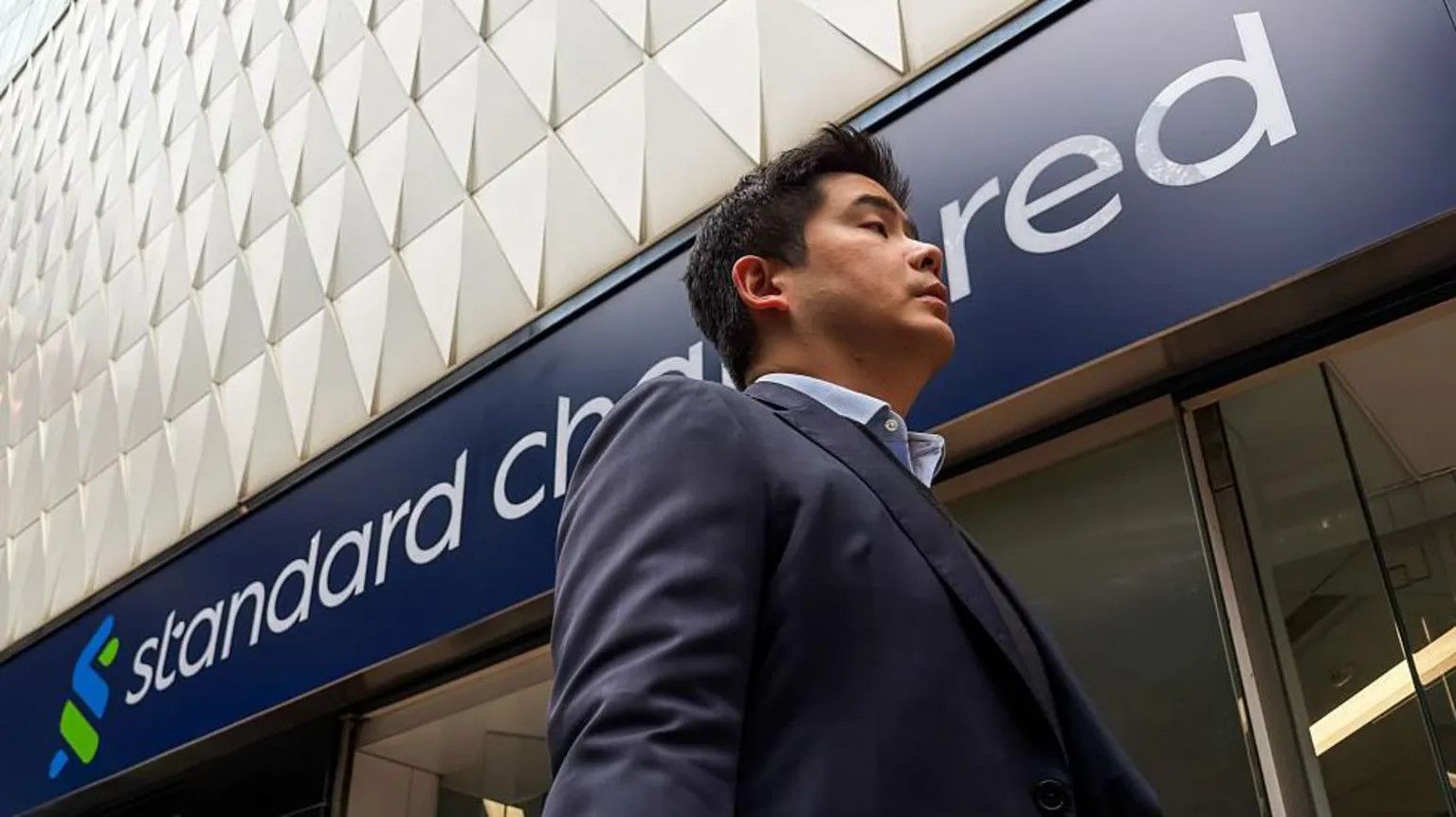 Standard Chartered to cut 7,800 back-office jobs by 2030 amid AI push