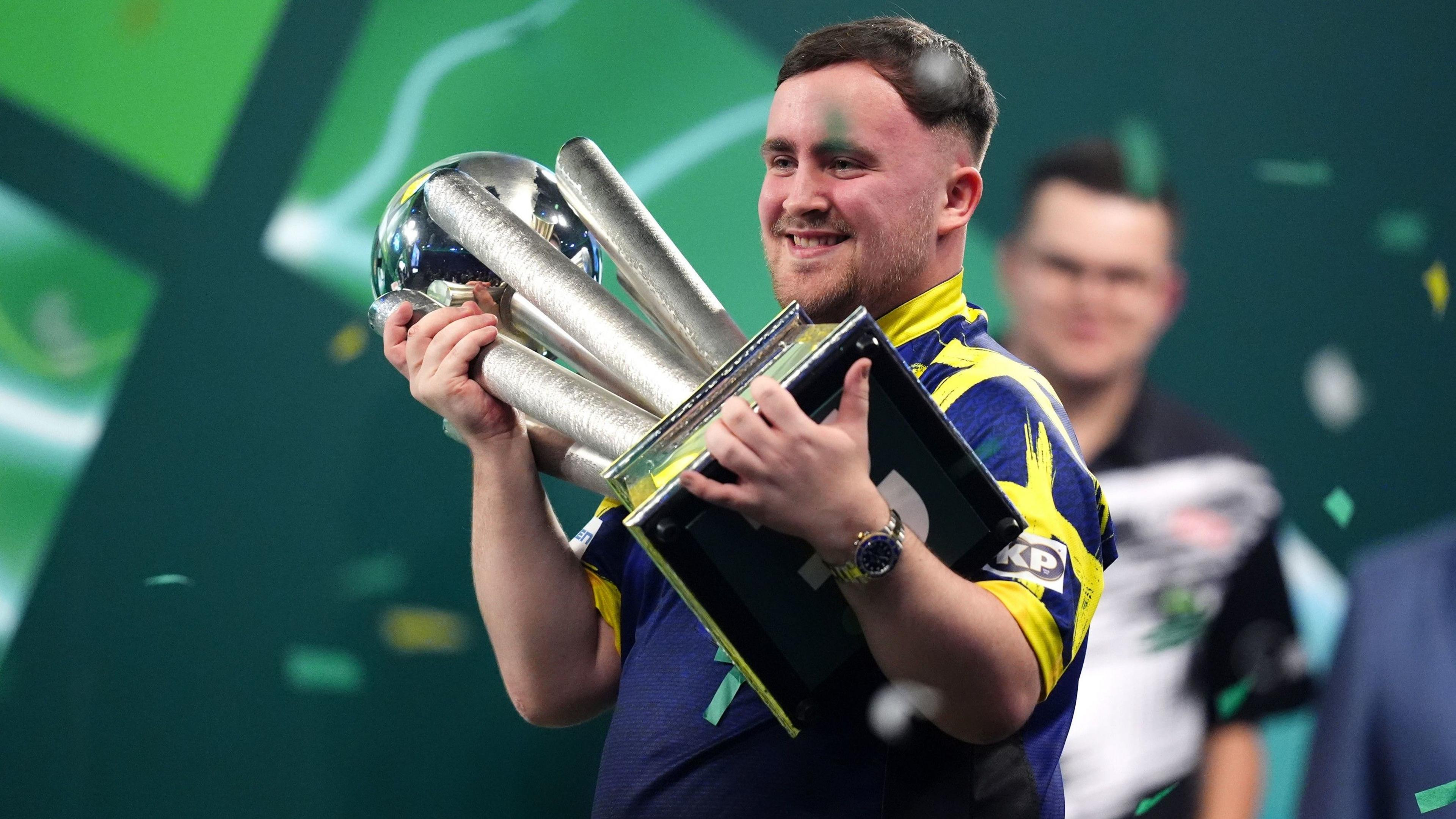 Teen phenom Littler defends PDC world title with near-flawless run