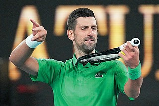Djokovic advances to Australian Open quarters after Mensik withdrawal