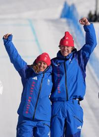 Great Britain claims historic first Olympic snow gold in mixed snowboard cross