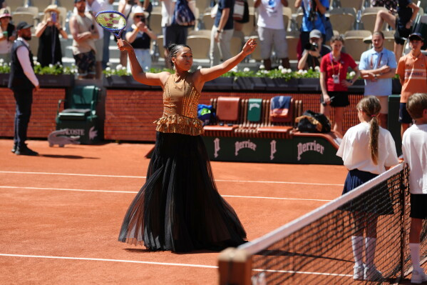 Naomi Osaka stuns French Open with gold-sequined tennis dress reveal